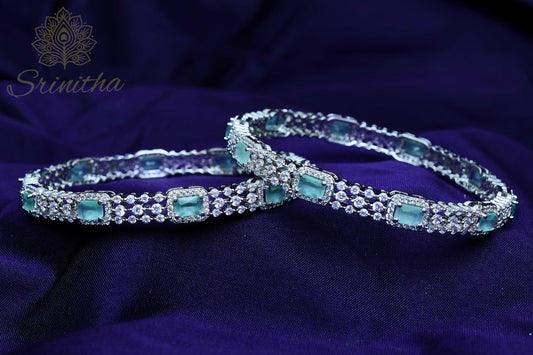Tārā Harita – Silver Bangles with Pastel Green Stones