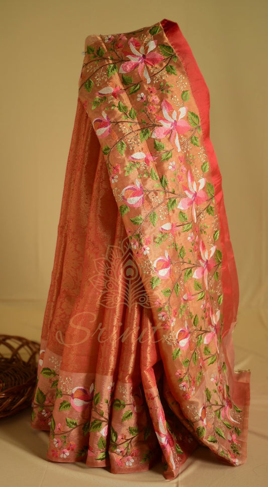 Kesarika – Jacquard Tissue Saree in Warm Orange with Embroidered Florals