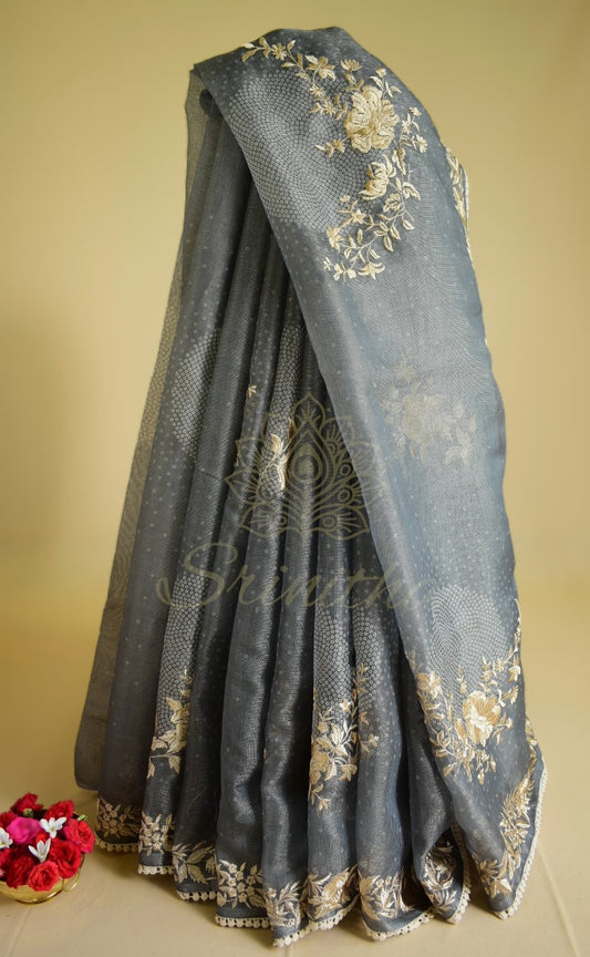 Shyaamalika – Grey Tissue Saree with Bandhani Weave & Thread Embroidery