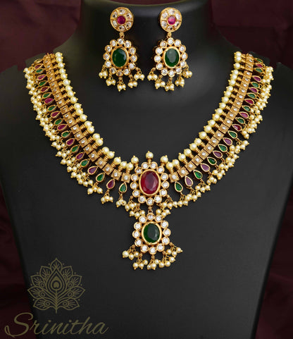 Kāñcanamālā Set (Golden Garland) – Ruby Green Kundan Temple Necklace with Matching Earrings