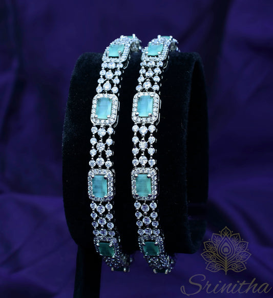 Tārā Harita – Silver Bangles with Pastel Green Stones