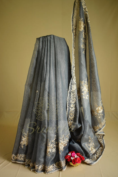 Shyaamalika – Grey Tissue Saree with Bandhani Weave & Thread Embroidery