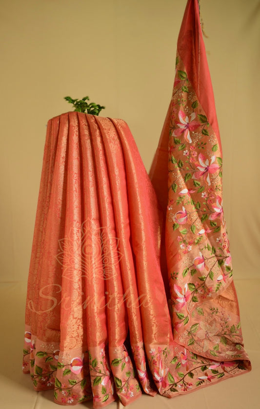 Kesarika – Jacquard Tissue Saree in Warm Orange with Embroidered Florals