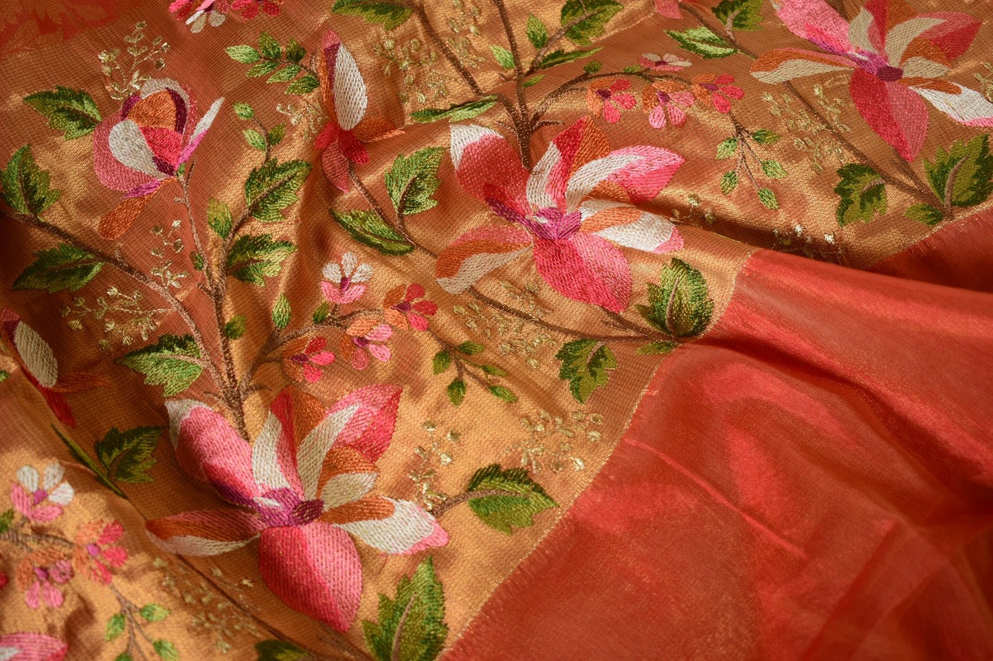 Kesarika – Jacquard Tissue Saree in Warm Orange with Embroidered Florals